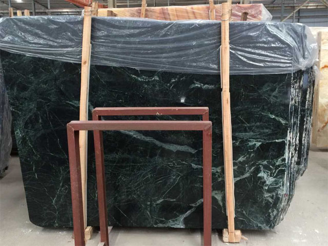 China white veined dark green marble slab