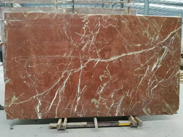 Spain white veined coral red marble
