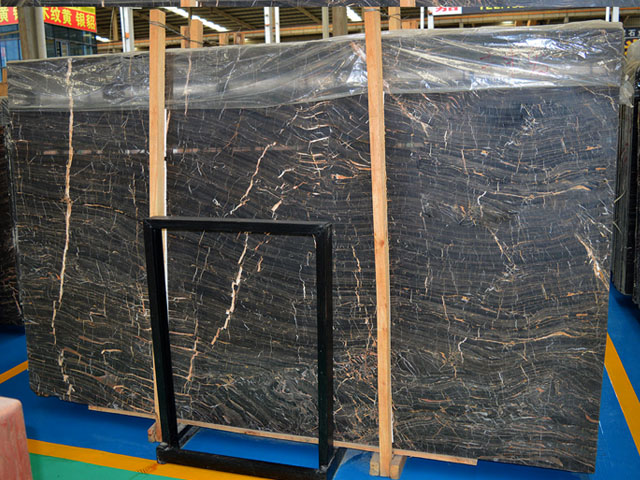 China golden wood grain black marble slab
