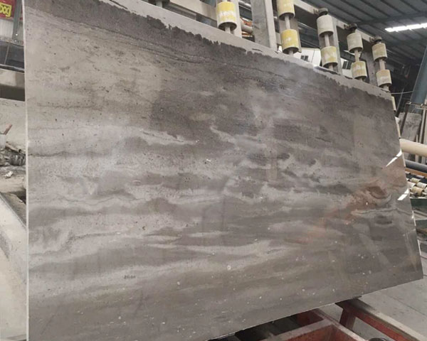 Wavy grain dark grey marble slab