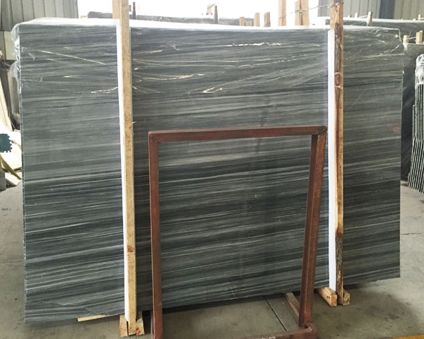 White and grey wood grain marble slab