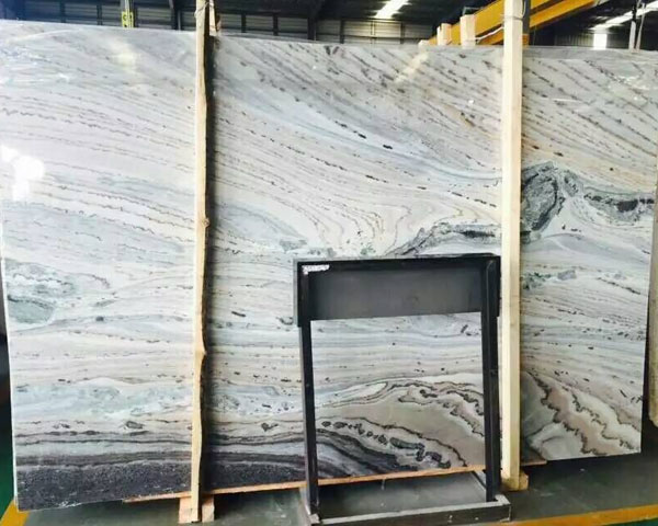 White wavy grain ocean blue marble slab