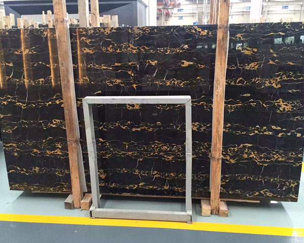 Imported gold vein black portopo marble from Italy
