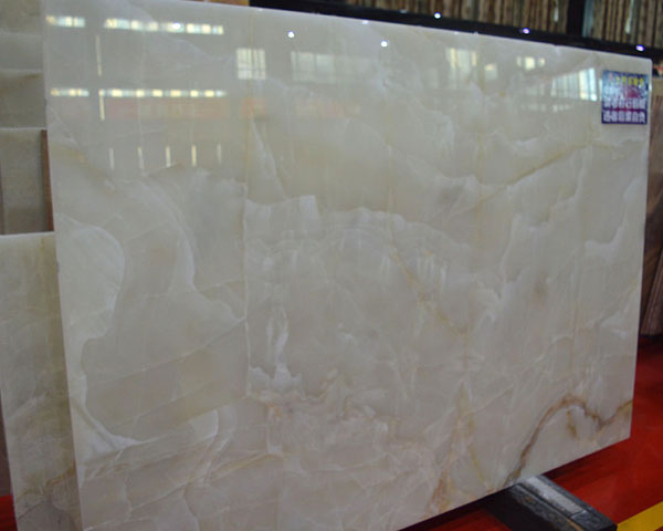 Gold silk pure white onyx marble price