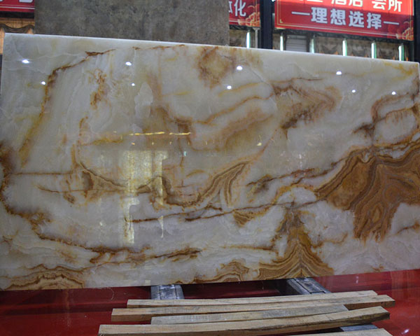 China gold wavy grain white onyx slab