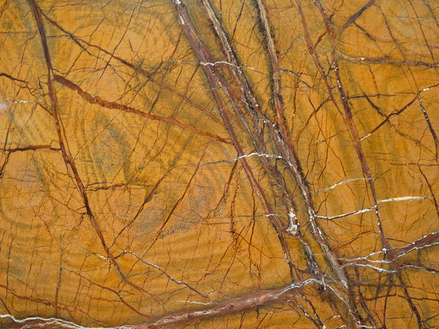 Rainforest golden brown marble Imported