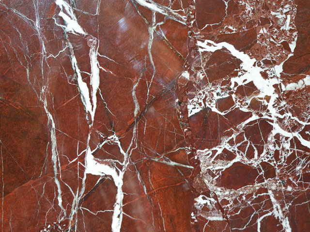 New coral red marble slab with white veins