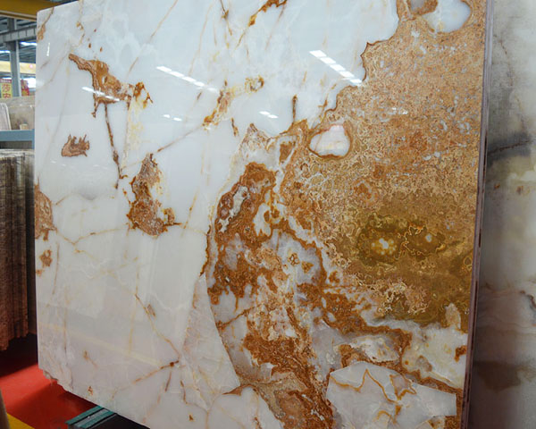 Translucent gold vein white onyx marble slab