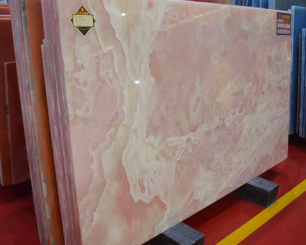 Discounted white river vein rose pink onyx slab