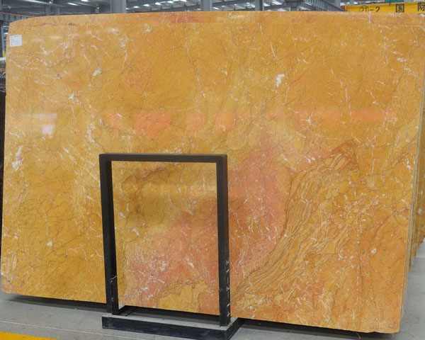 China caren gold wavy grain marble slab supplier